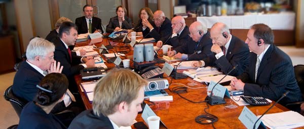 The Claims Conference negotiating delegation, right, meets every year with German government officials to press a number of issues of concern to Jewish victims of Nazism.